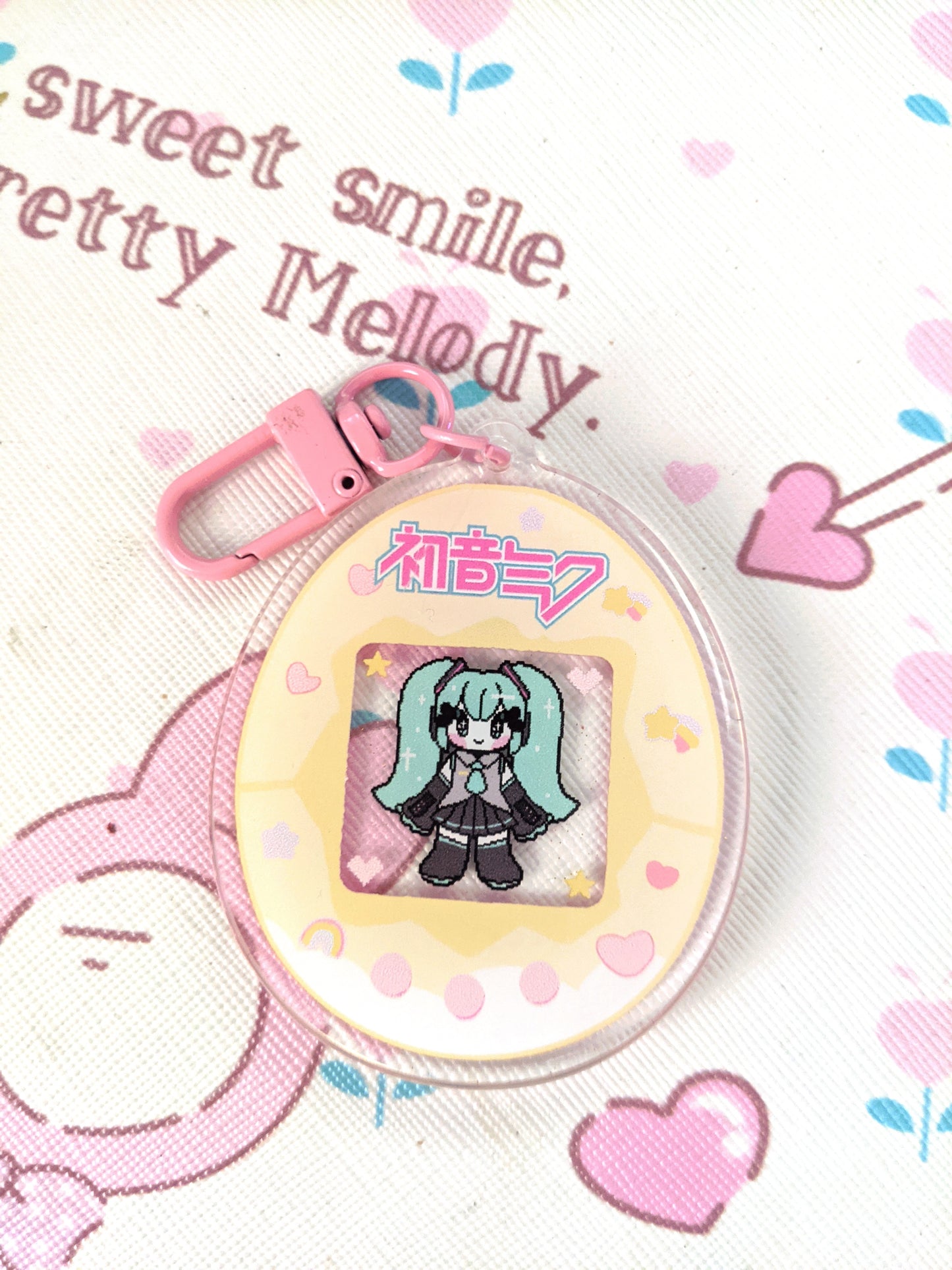 Tamagotchi Miku Double-Sided Acrylic Charm